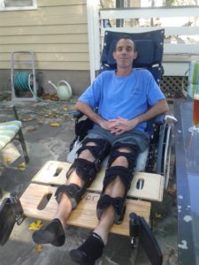 Reclining wheelchair and bridge for legs